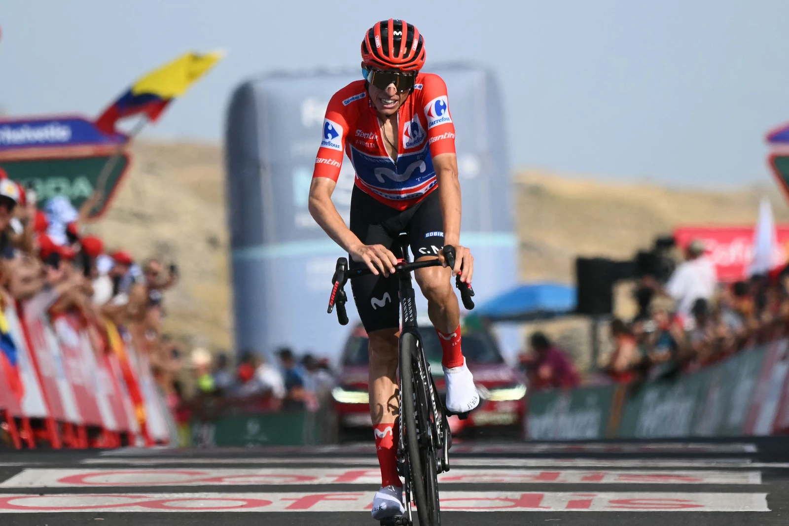 Mas survives final test to all but secure Vuelta victory