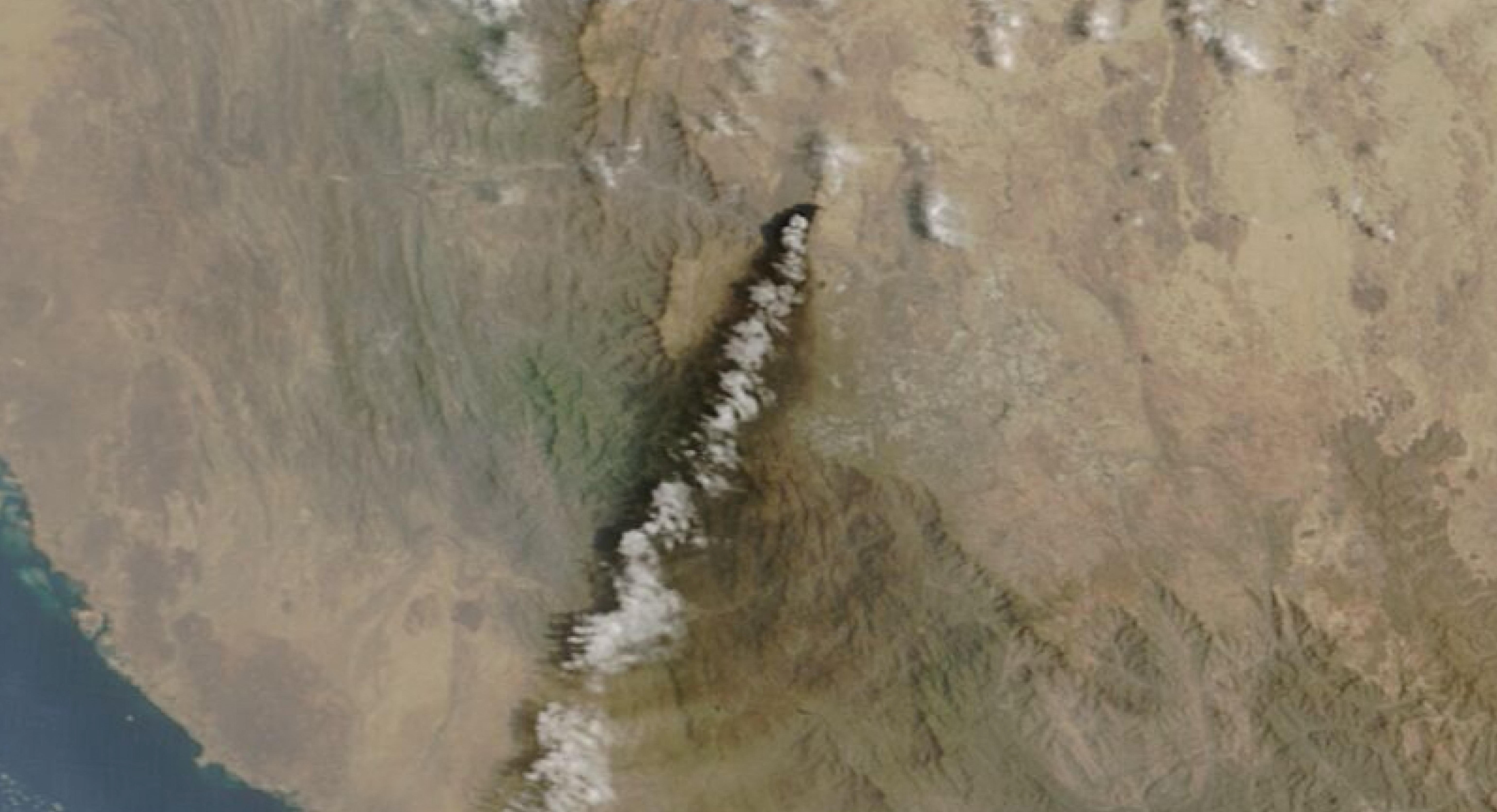 A satellite image shows smoke rising from the Saudi Aramco distribution centre, following attacks by Yemen's Iran-aligned Houthis. NASA WORLDVIEW/REUTERS/File