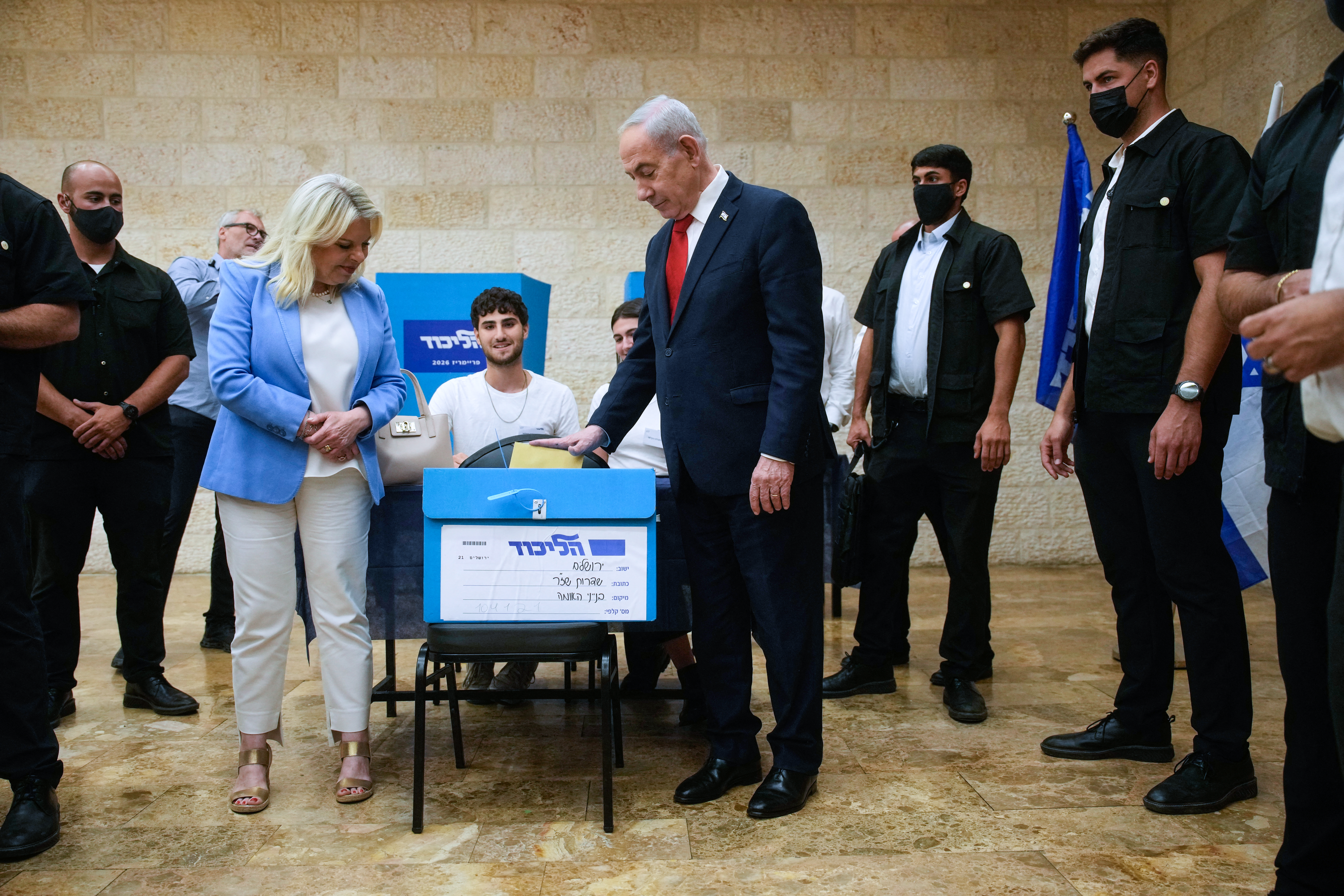 Netanyahu, (C-R), and his wife, Sara, (C-L) cast their ballot during primary elections ahead of Israel’s general election in October in Jerusalem on Aug. 17, 2026. (AFP)