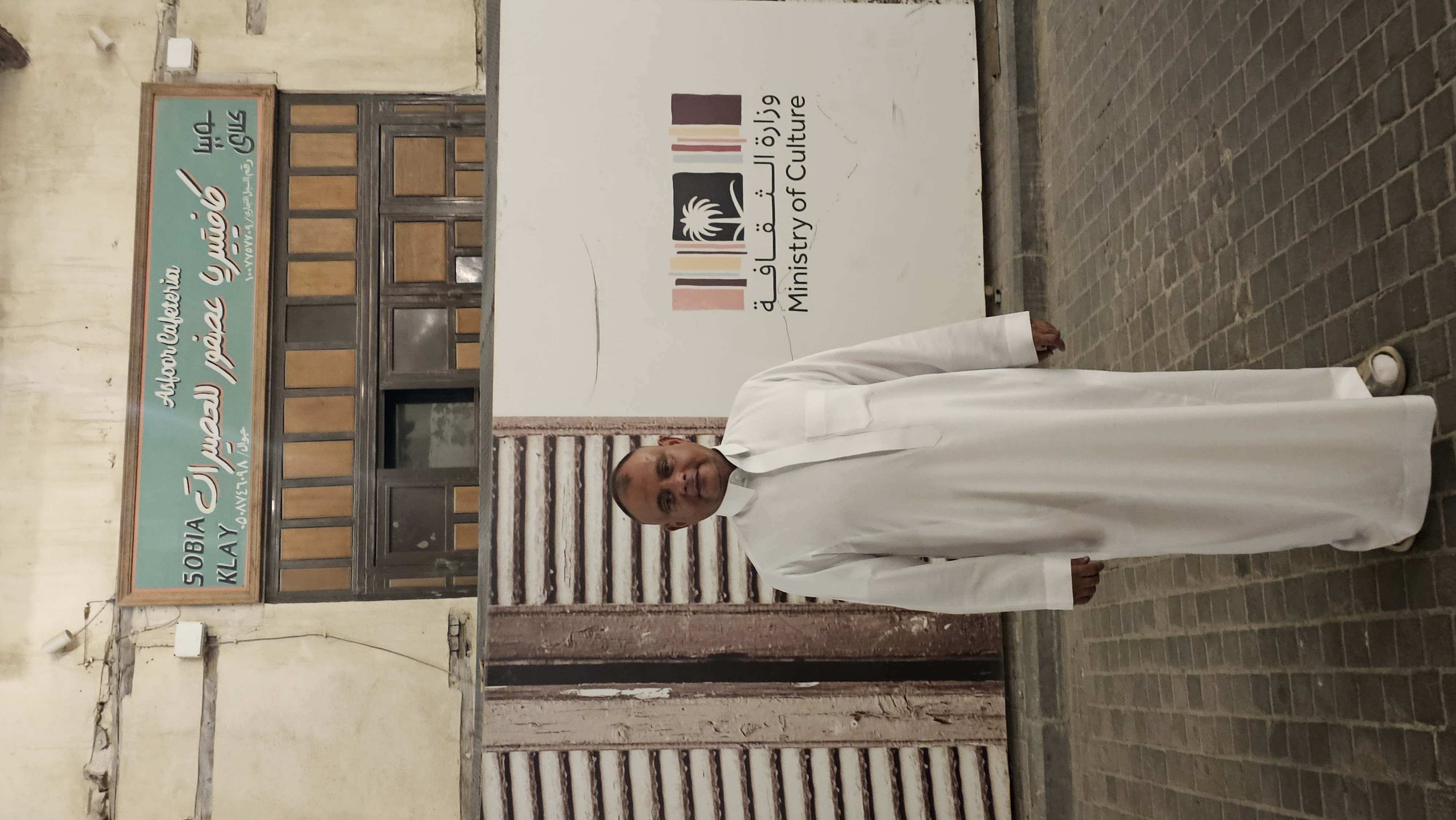 Khalid Najee stands in front of The Bird Shop.