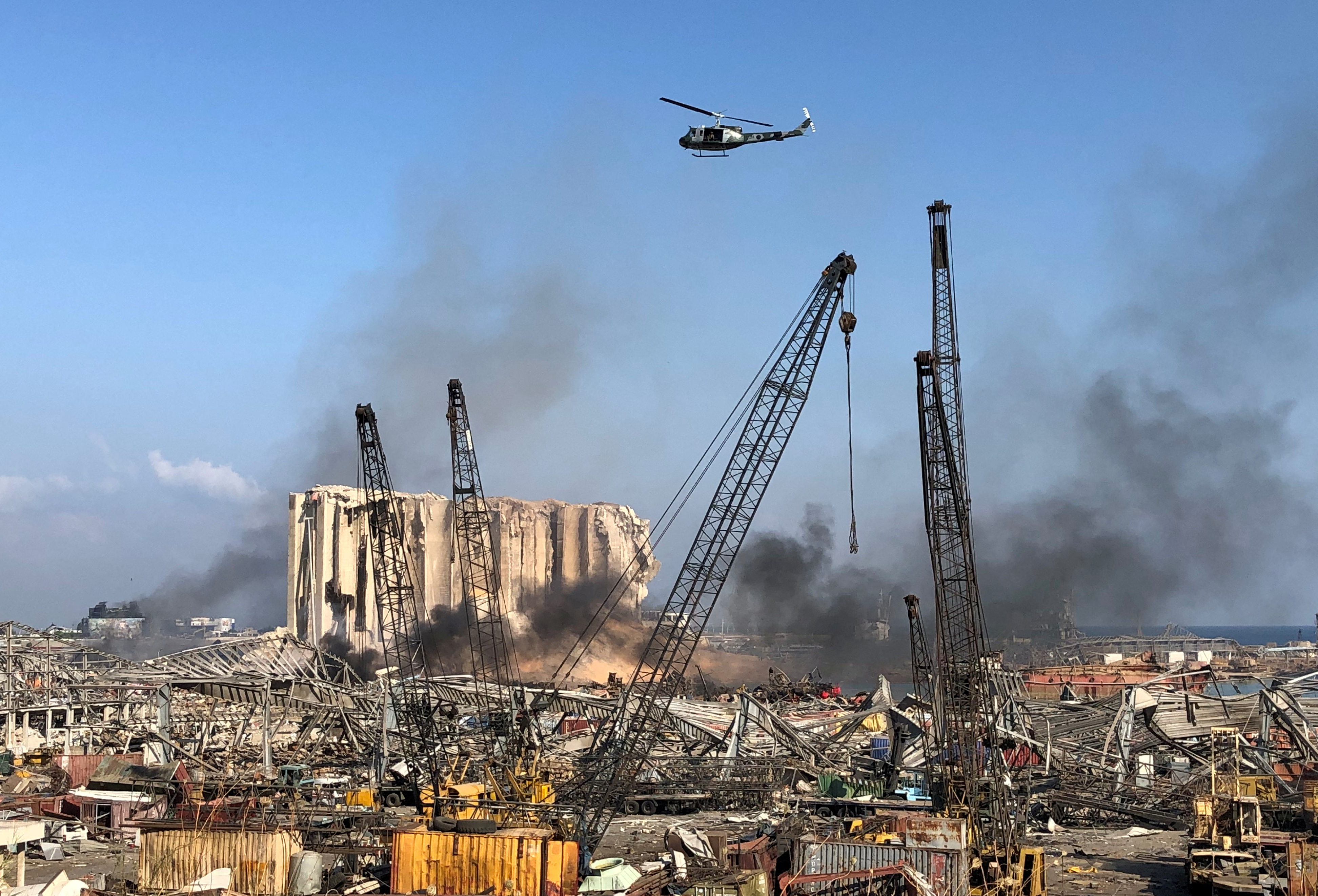 A Lebanese army helicopter flies over the site of Tuesday's blast in Beirut's port area, Lebanon August 5, 2020. (REUTERS/File photo)