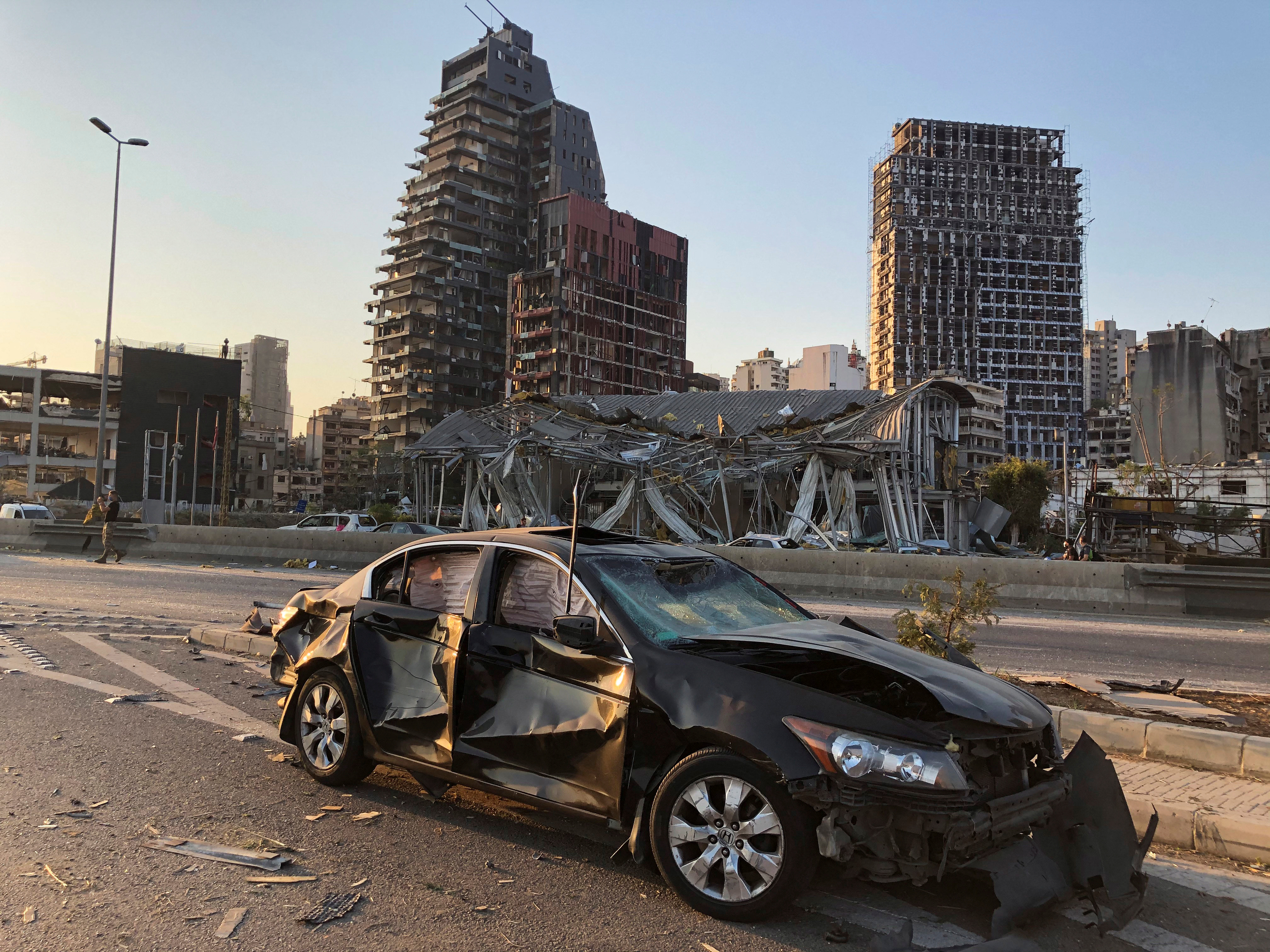 Damaged vehicle and buildings are pictured near the site of Tuesday's blast in Beirut's port area, Lebanon August 5, 2020. (REUTERS/File photo)