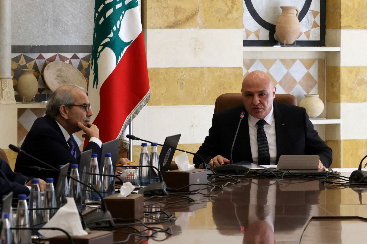 Lebanese President Joseph Aoun (R) and Prime Minister Nawaf Salam attending a cabinet session at the Presidential Palace in Baabda, on September 5, 2025. (AFP/File photo)