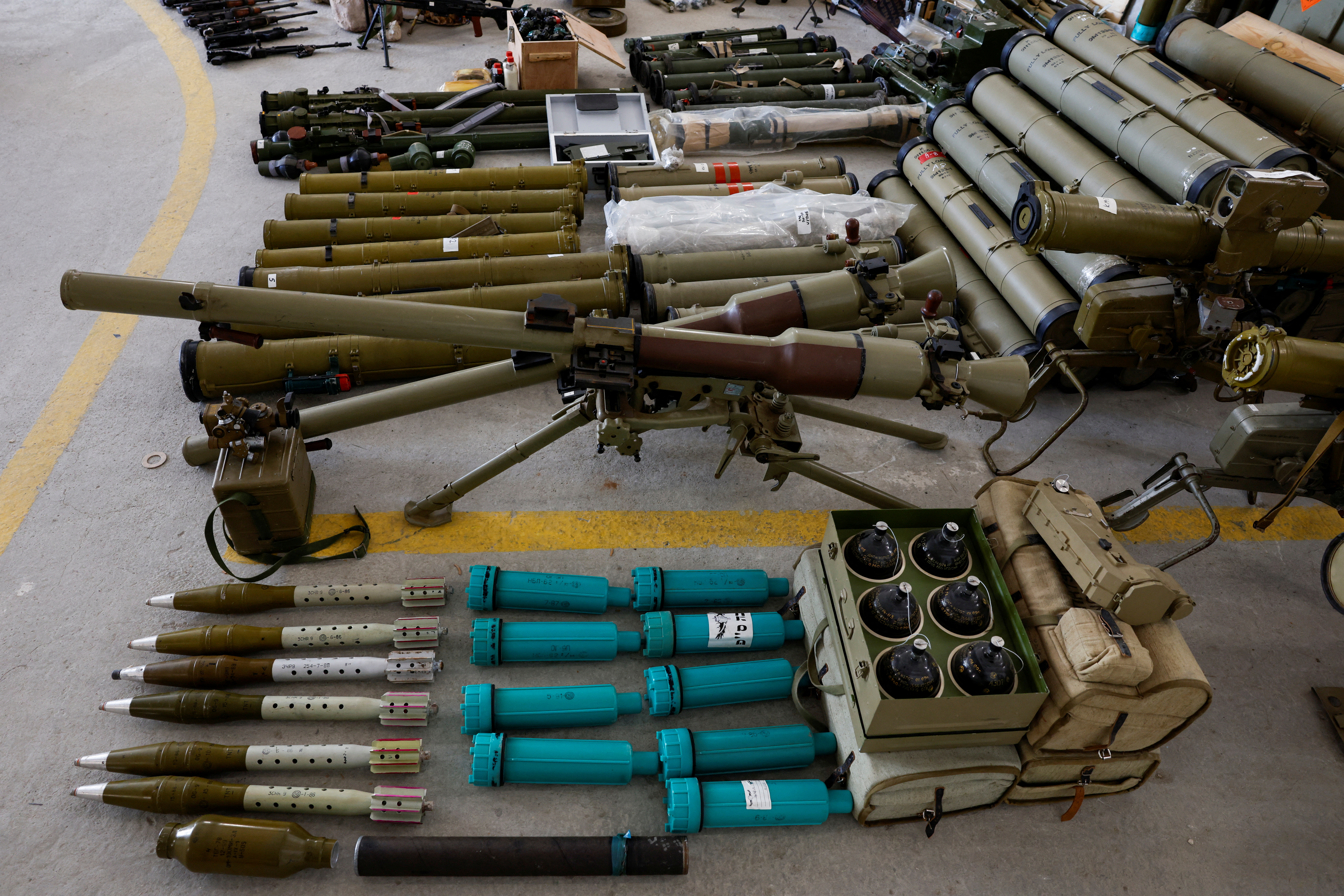 Weapons and ammunitions are displayed by Israel's military, that they say were seized during the ground operation in Lebanon, at Julis army base, in southern Israel, October 9, 2024. REUTERS/Amir Cohen