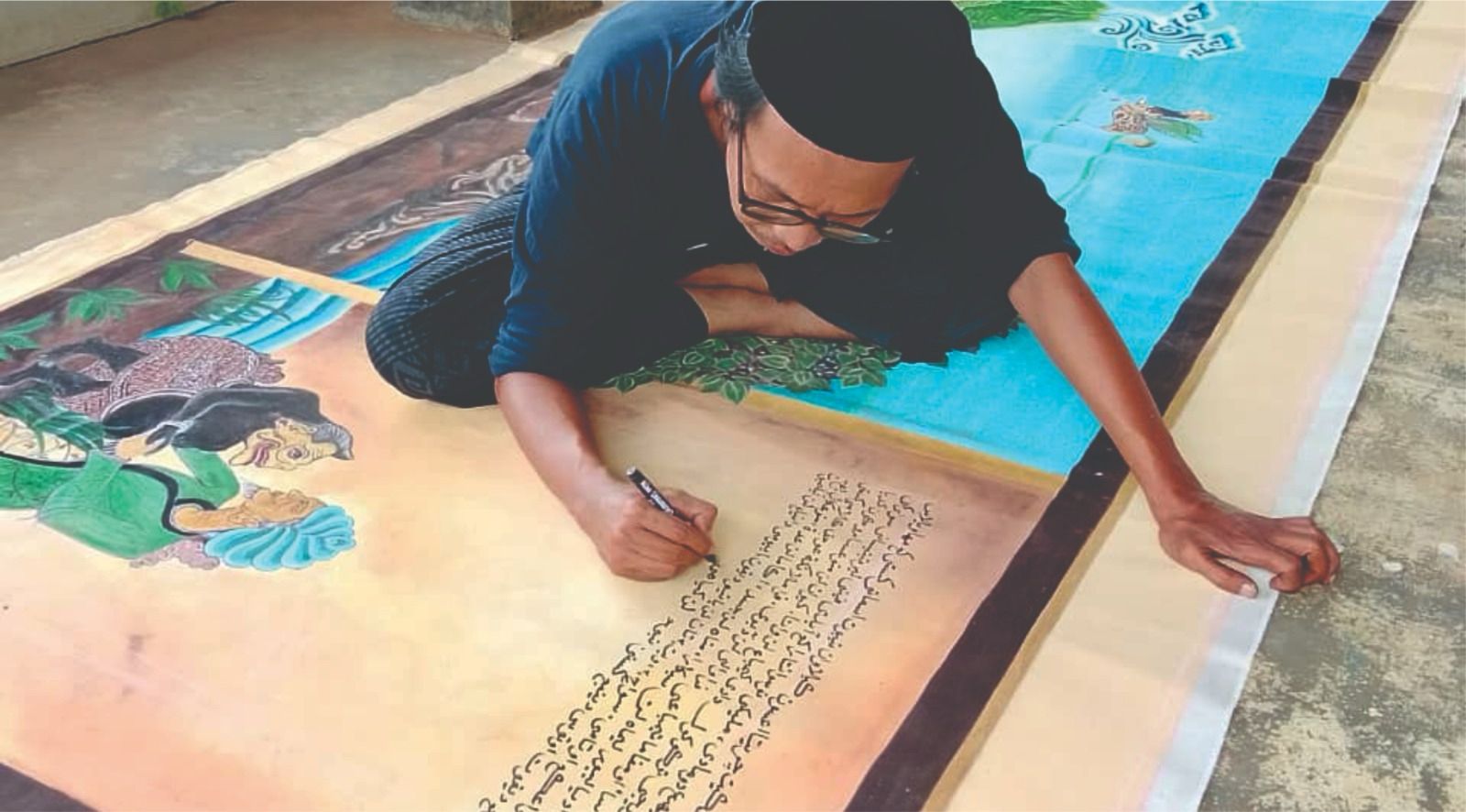 Faisal Kamandobat works on his illuminated manuscript in Pegon Arabic script in Majenang, Central Java, Aug. 13, 2026. (Faisal Kamandobat)