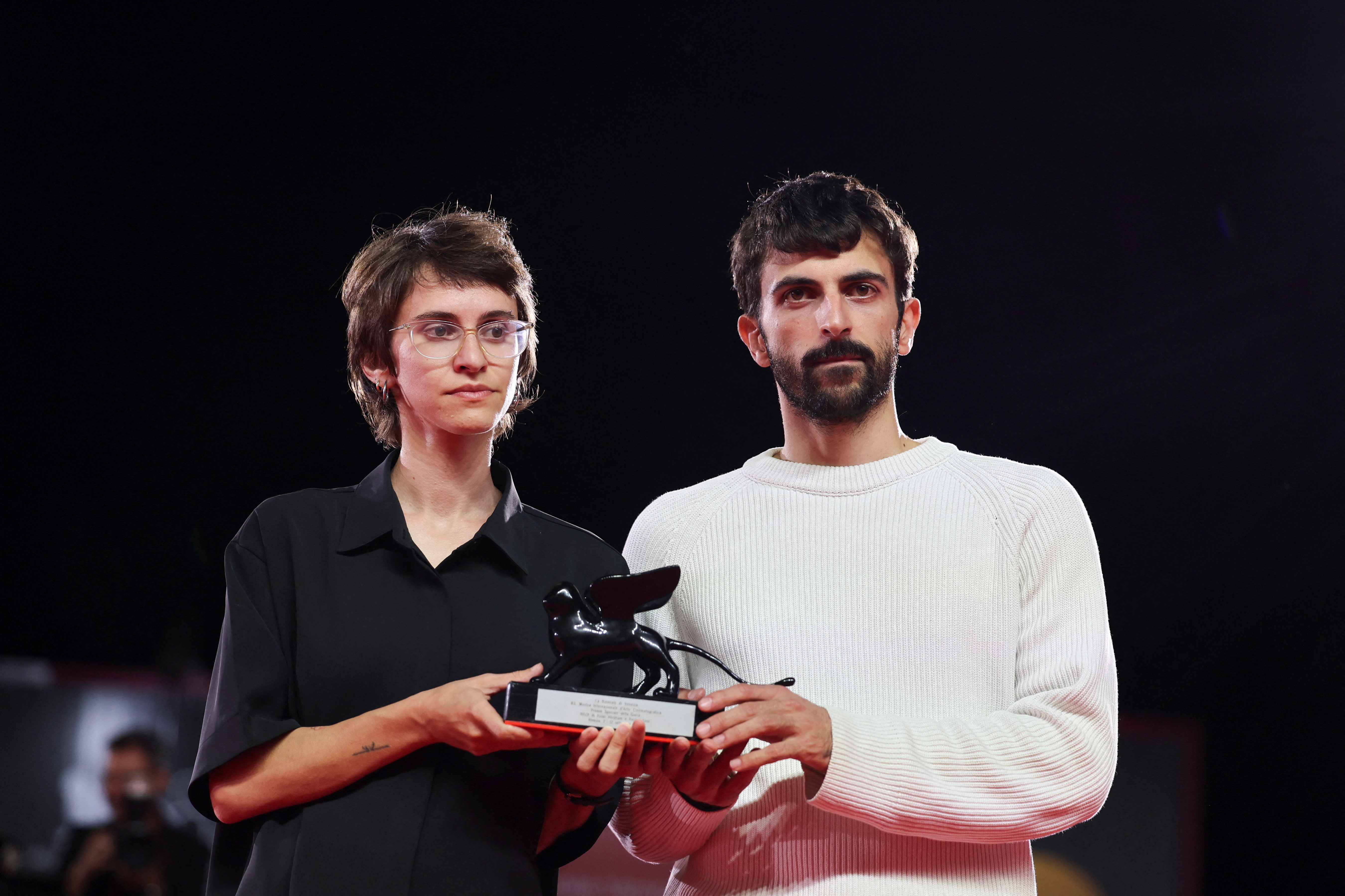 Israeli directors Yuval Abraham and Rachel Szor, left, at the closing ceremony of the Venice International Film Festival. (Reuters)