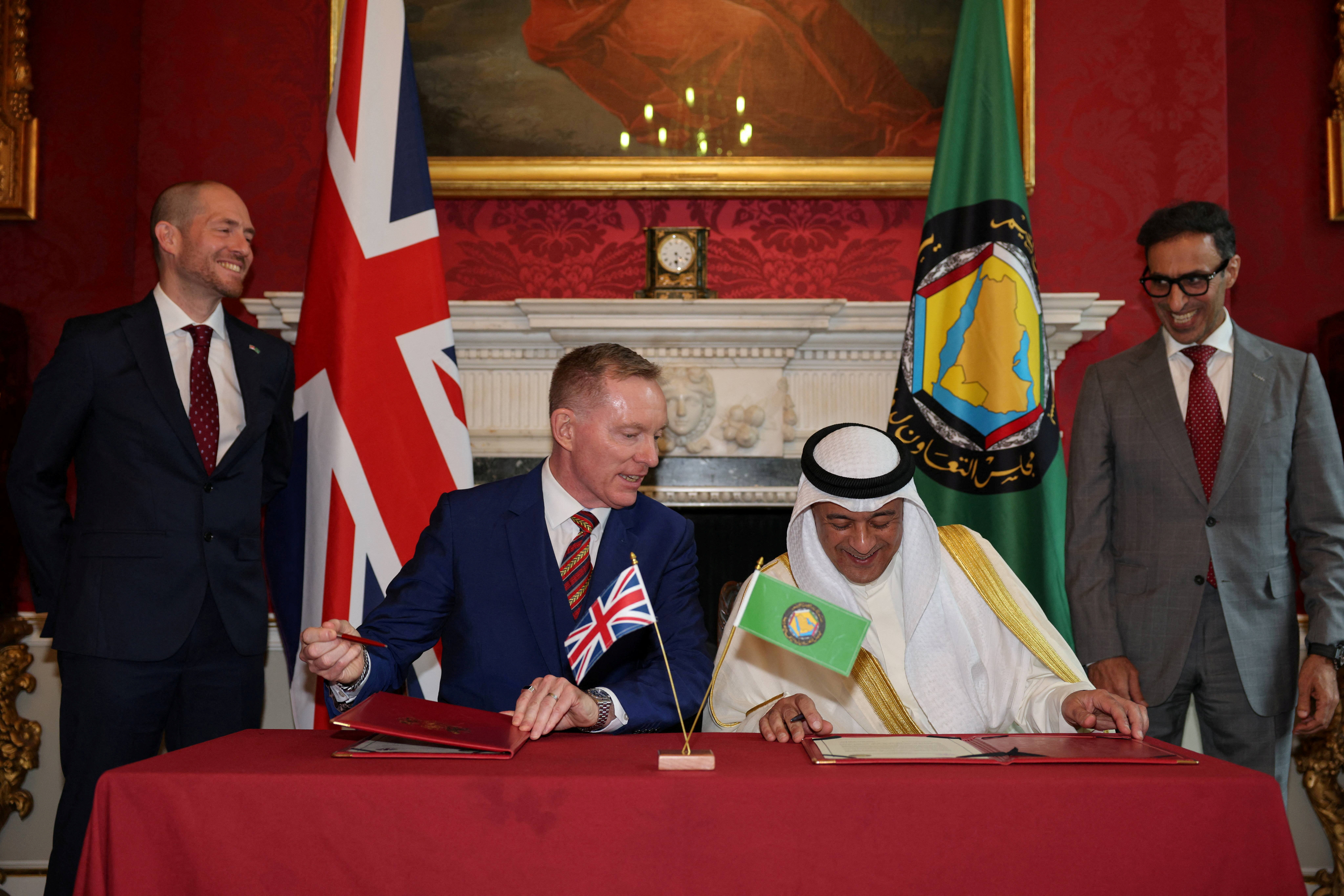 British Minister of State for Trade Chris Bryant and Jasem Mohamed Albudaiwi, secretary general of the Gulf Cooperation Council, take part in a signing ceremony at Downing Street in London on May 20, 2026. (Pool via REUTERS)