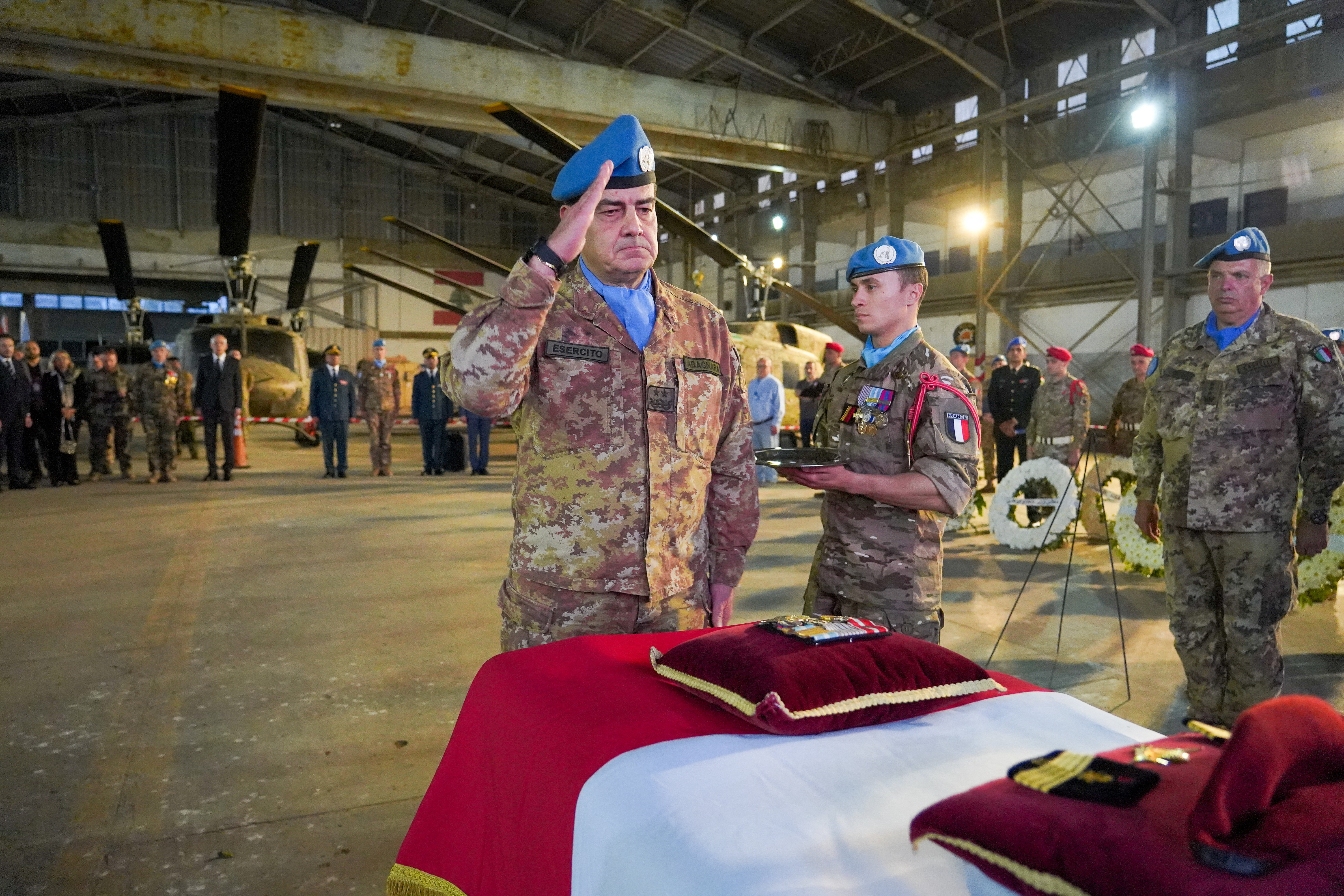 UNIFIL Head of Mission and Force Commander Maj. Gen. Diodato Abagnara pays tribute to Florian Montorio, who was killed while clearing a road in southern Lebanon in an attack officials said was likely carried out by Hezbollah. REUTERS/File