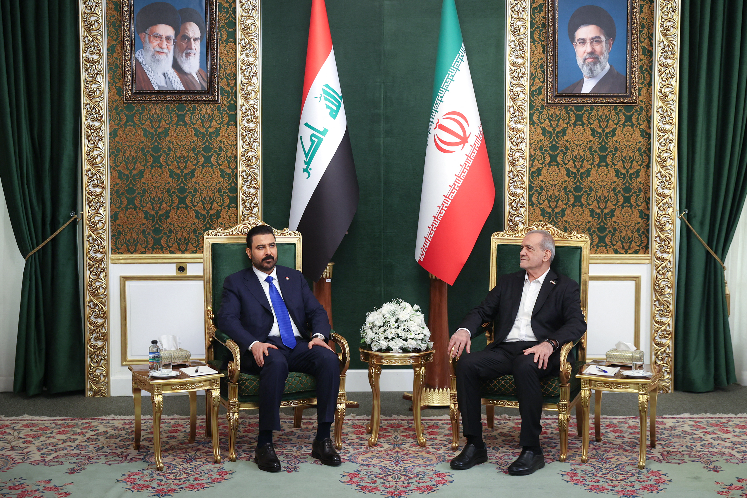 Iranian President Masoud Pezeshkian (R) meeting with Iraqi Prime Minister Ali al-Zaidi in the Iranian capital Tehran earlier this year. (AFP file)