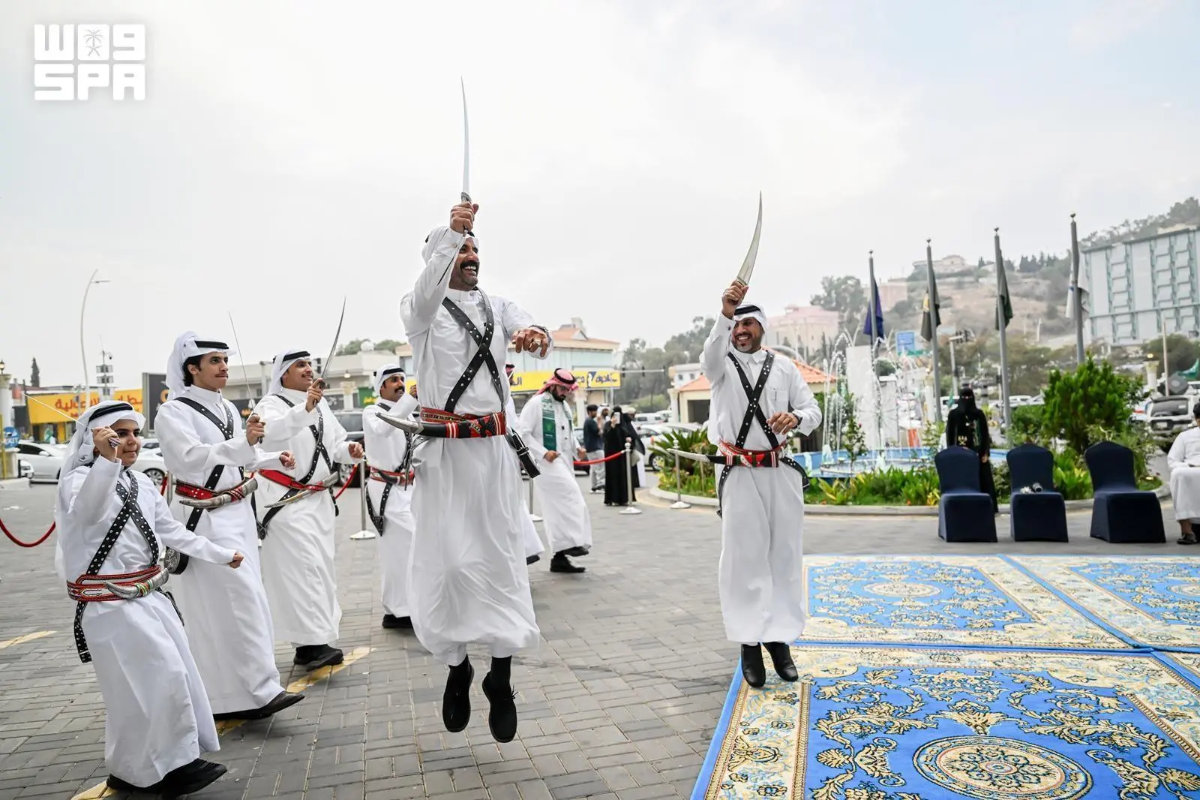 Artists perform the Al Arda dance in Al-Baha. (SPA)