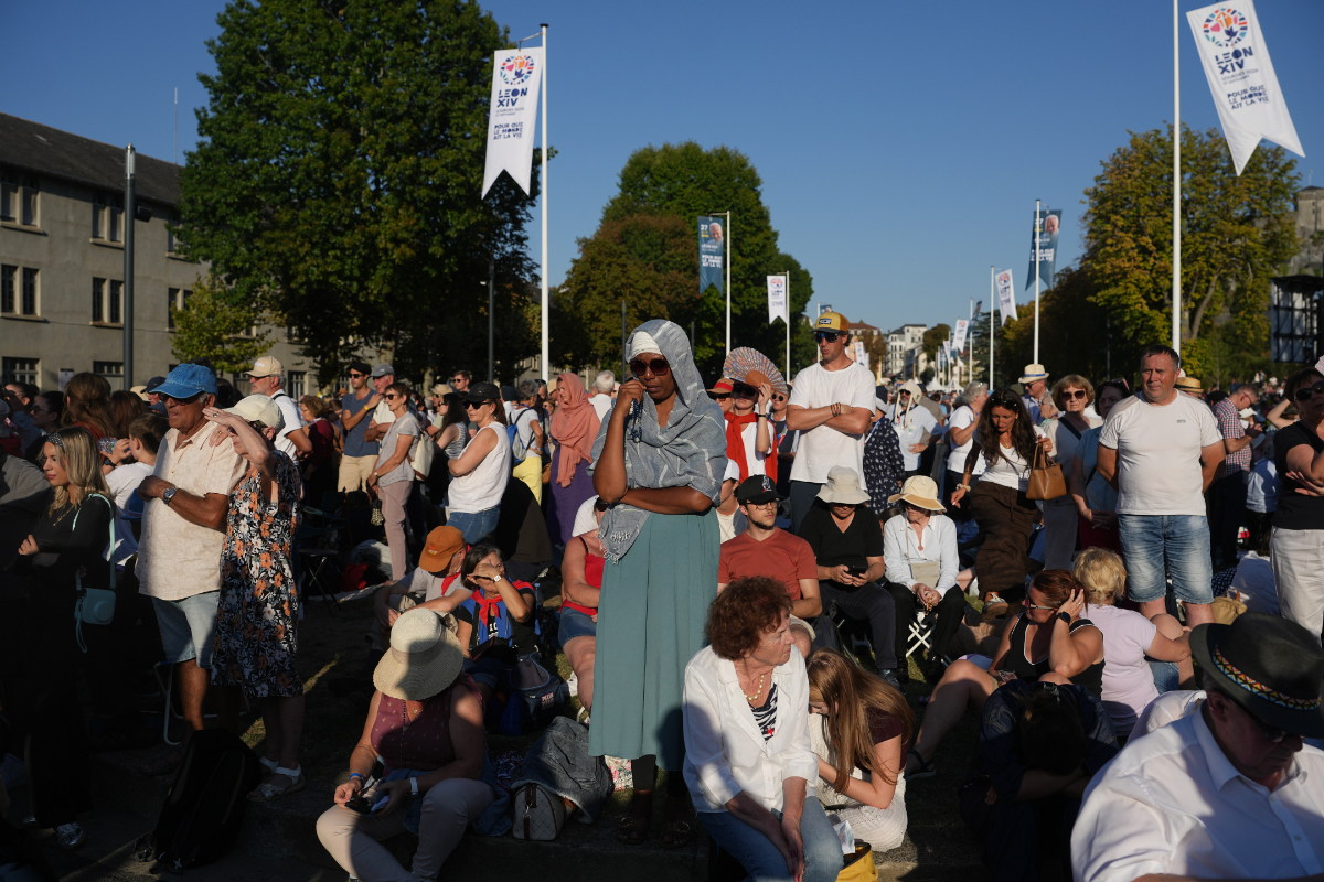 People wait for the arrival of Pope Leo XIV for a prayer at the Grotto of the Apparitions of Massabielle, at the Shrine of Our Lady of Lourdes, Sept. 26, 2026. (AP)