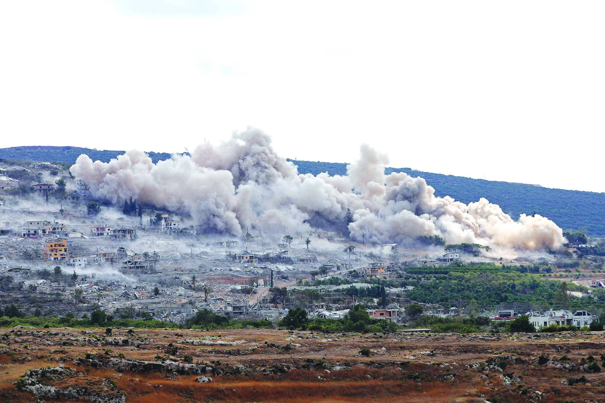 This photograph taken from the southern Lebanese village of Hanniyeh shows smoke rising from the site of a series of Israeli controlled explosions in the nearby village of al-Mansouri on September 28, 2026. (Photo by Kawnat HAJU / AFP)