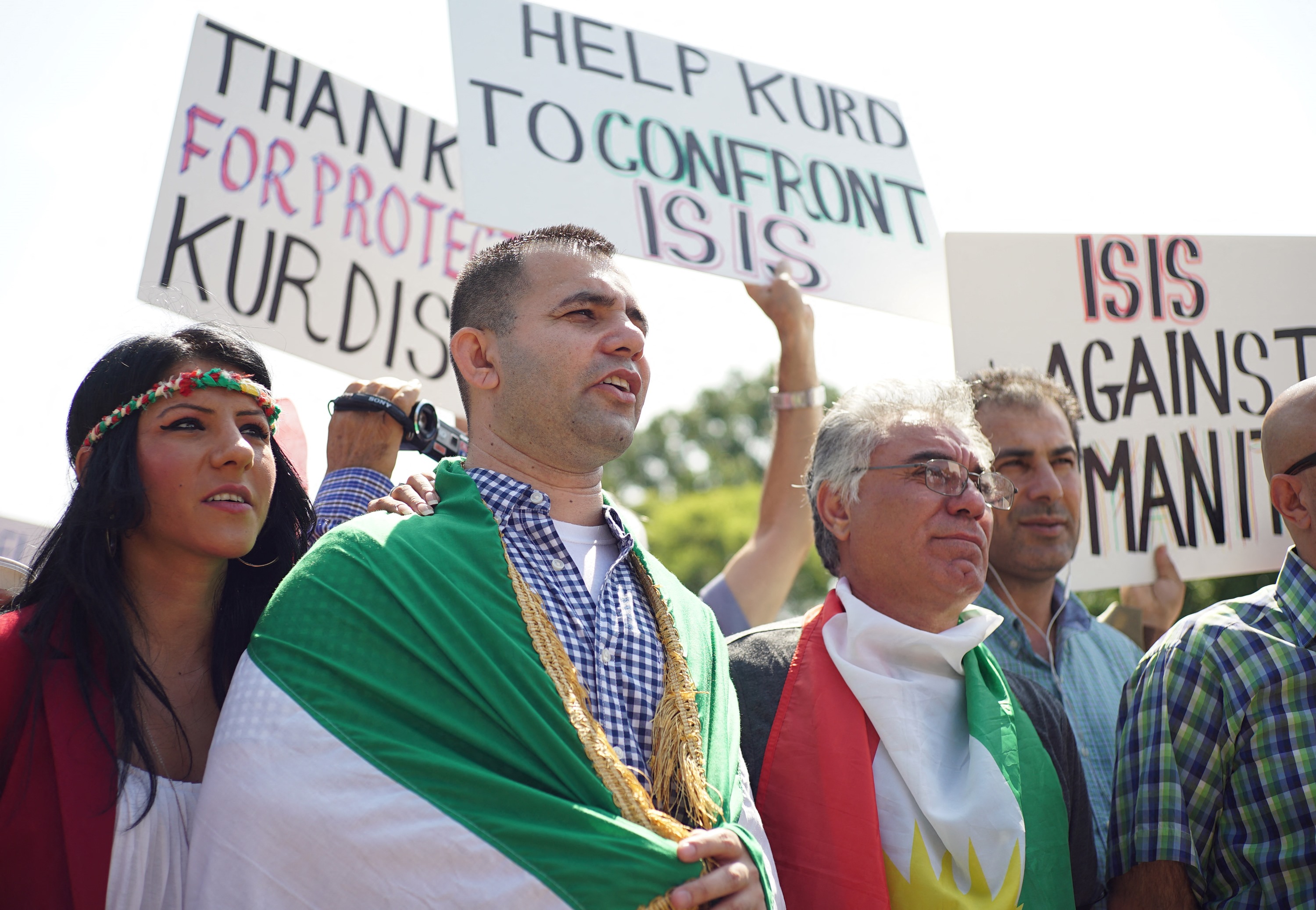 Demonstrators at a rally supporting Kurdistan hold placards protesting against Daesh in front of the White House. (AFP file)