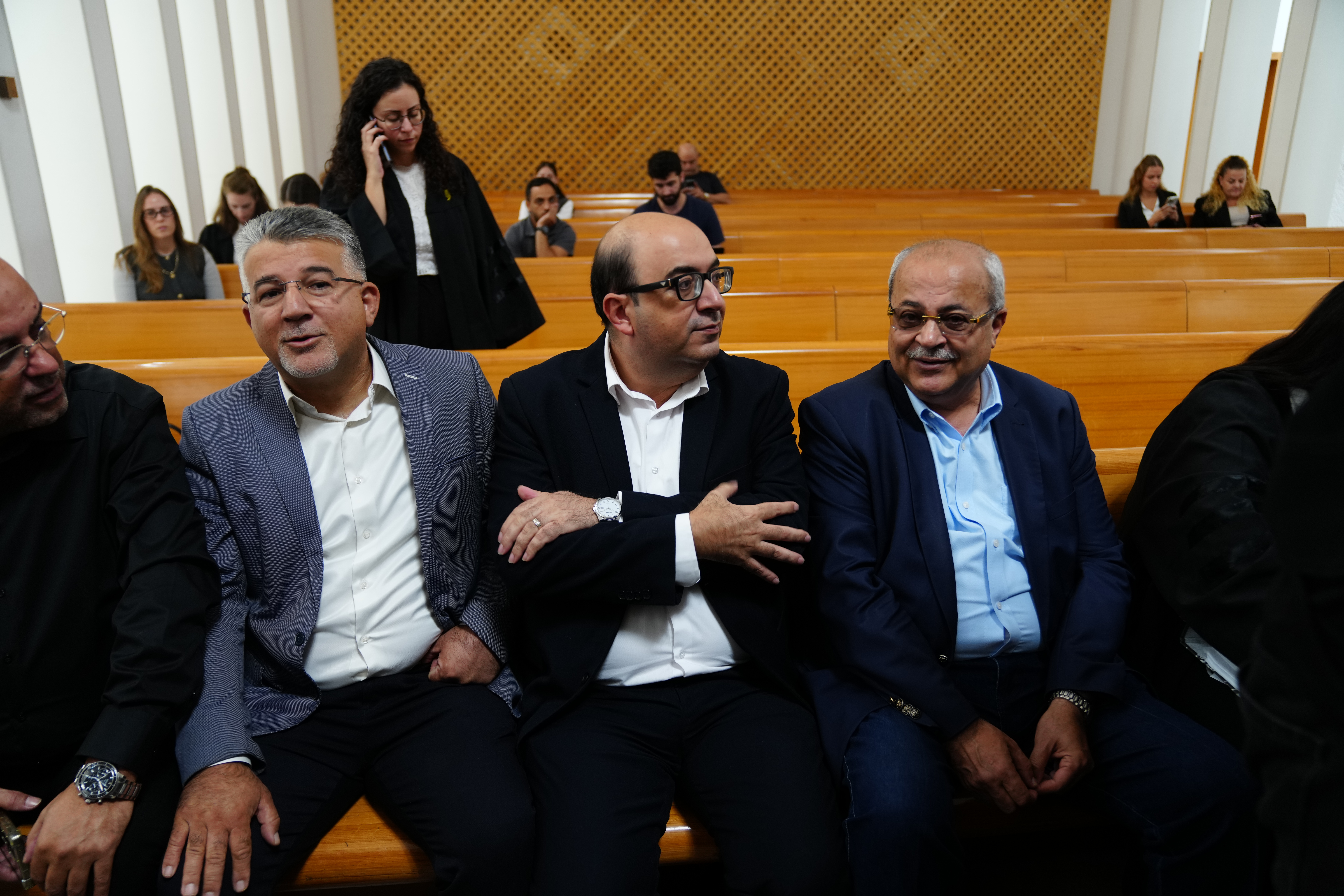 Arab-Jewish Hadash party leader Yousef Jabareen, second from left, nationalist Balad party leader Sami Abu Shehadeh, center, and Israeli parliament member Ahmad Tibih attend a hearing at Israel's Supreme Court on the electoral eligibility of Abu Shehadeh and two leading Arab parties, in Jerusalem, Thursday, Oct. 1, 2026. (AP Photo/Mahmoud Illean)