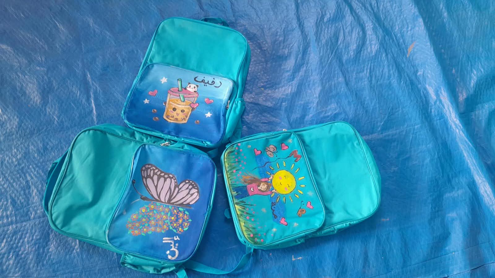 For children who have lost homes, schools and loved ones, a painted bag offers something personal, a child psychologist says. (Supplies)