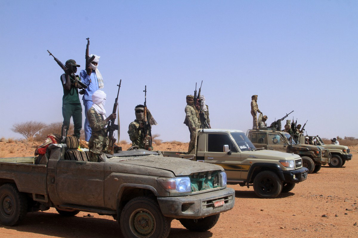 Tigray People's Liberation Front fighters walk in lines towards another field in Mekele, the capital of Tigray region, Ethiopia, on June 30, 2021. (AFP)