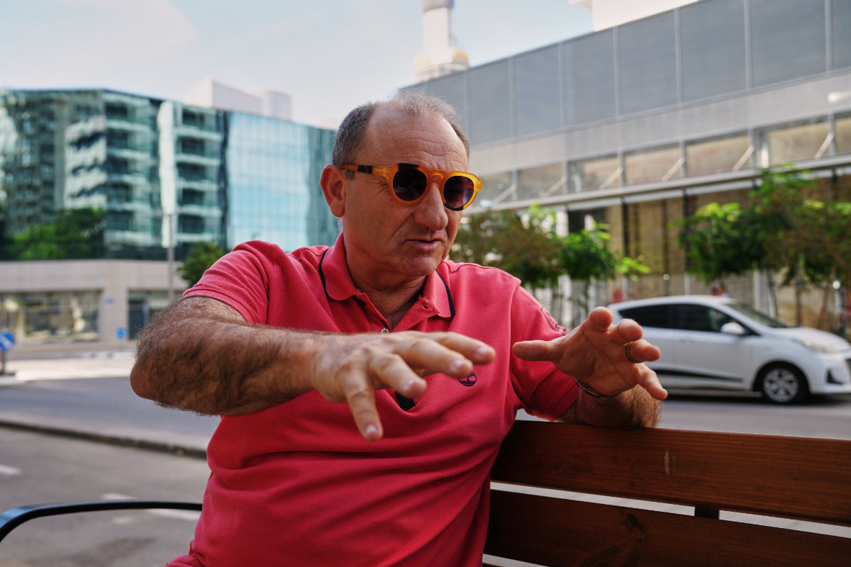 Daniel Schlichter speaks during an interview about an attack that occurred while he was aboard a FlyDubai flight bound for Israel, in Tel Aviv, Israel, Oct. 2, 2026. (AP Photo/Mahmoud Illean)