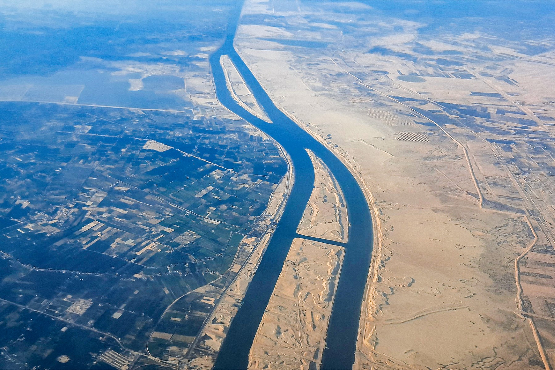 An aerial view of the new extension to the Suez Canal which was inaugurated in 2015 in northeastern Egypt. (AFP file)