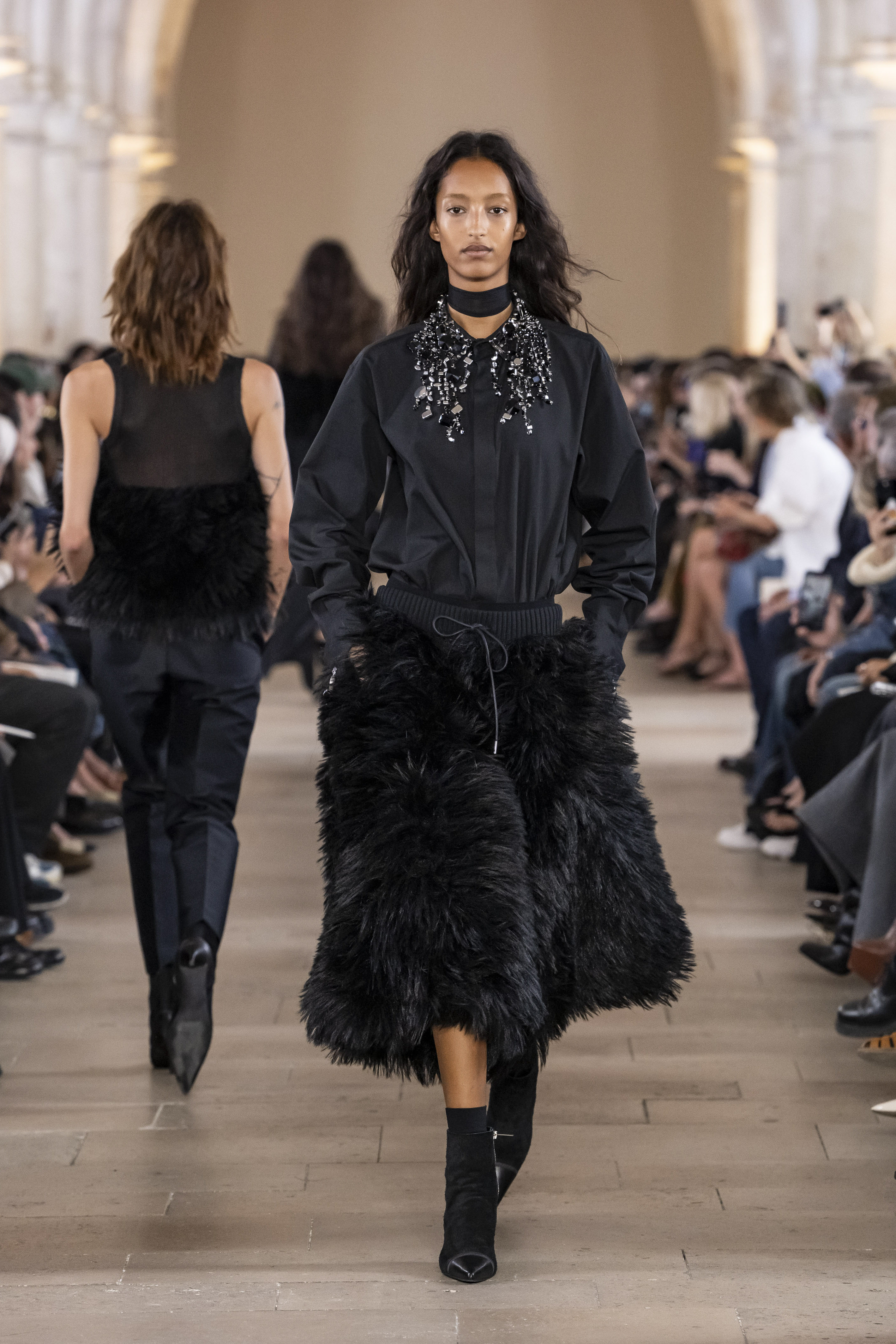 At Sacai, Tougaard wore an all-black look. (Getty Images)