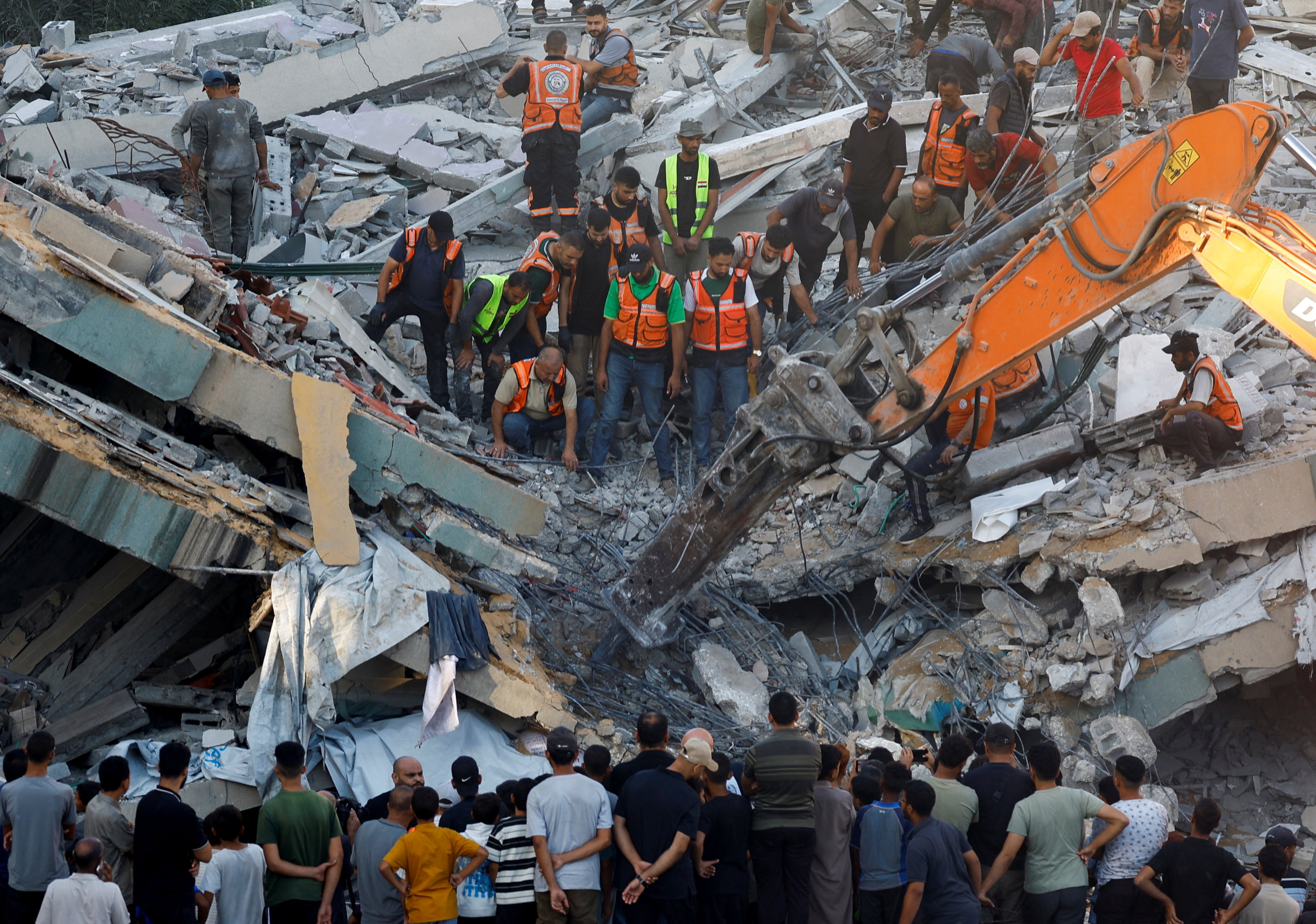 Clearance teams say restrictions on equipment classified by Israel as “dual-use” have hindered efforts to remove the vast quantities of rubble. (Reuters)