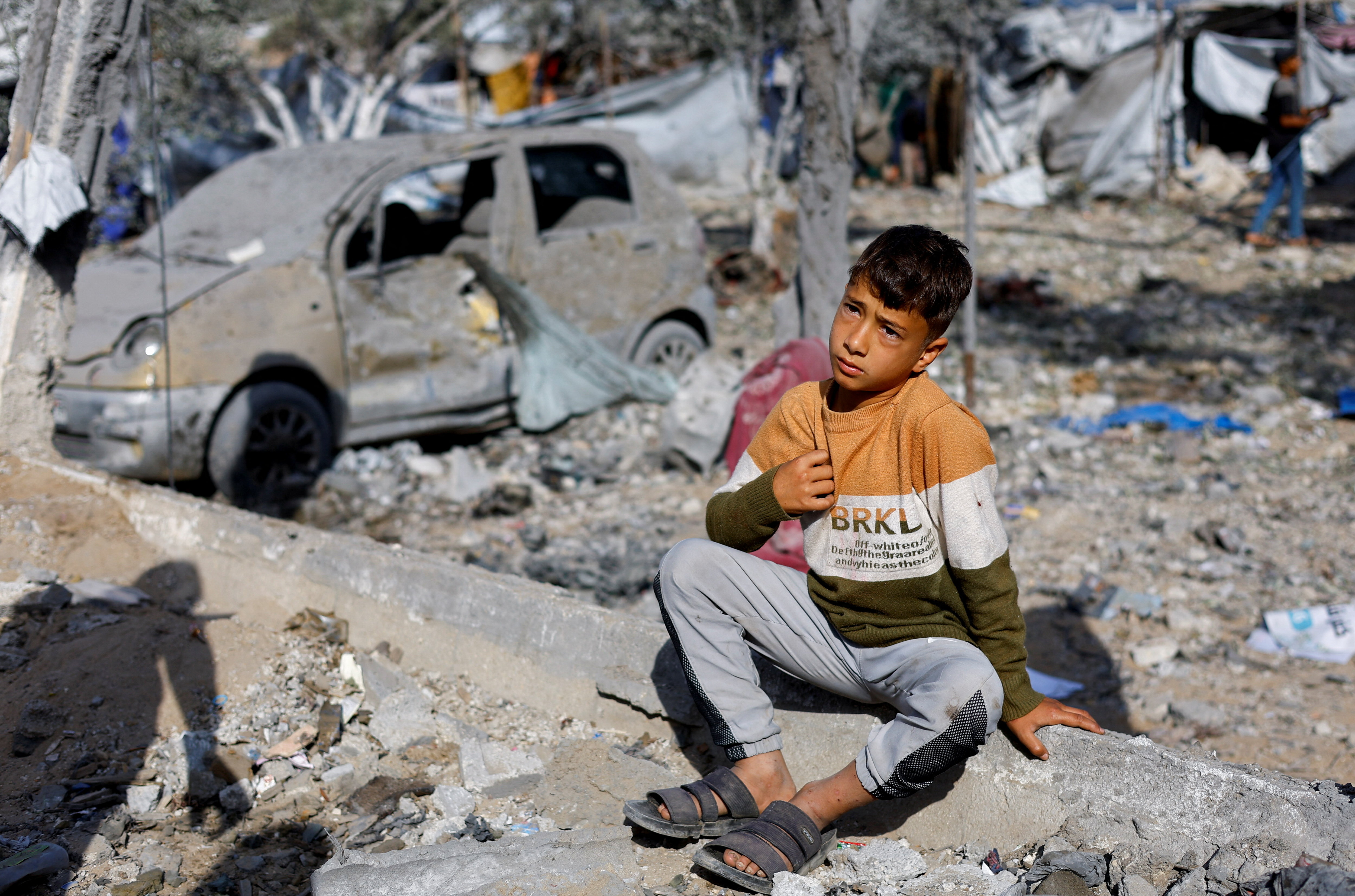 A Palestinian child amid the devastation in Gaza, where three years of war have reshaped childhood through displacement, loss and trauma. (Reuter file)