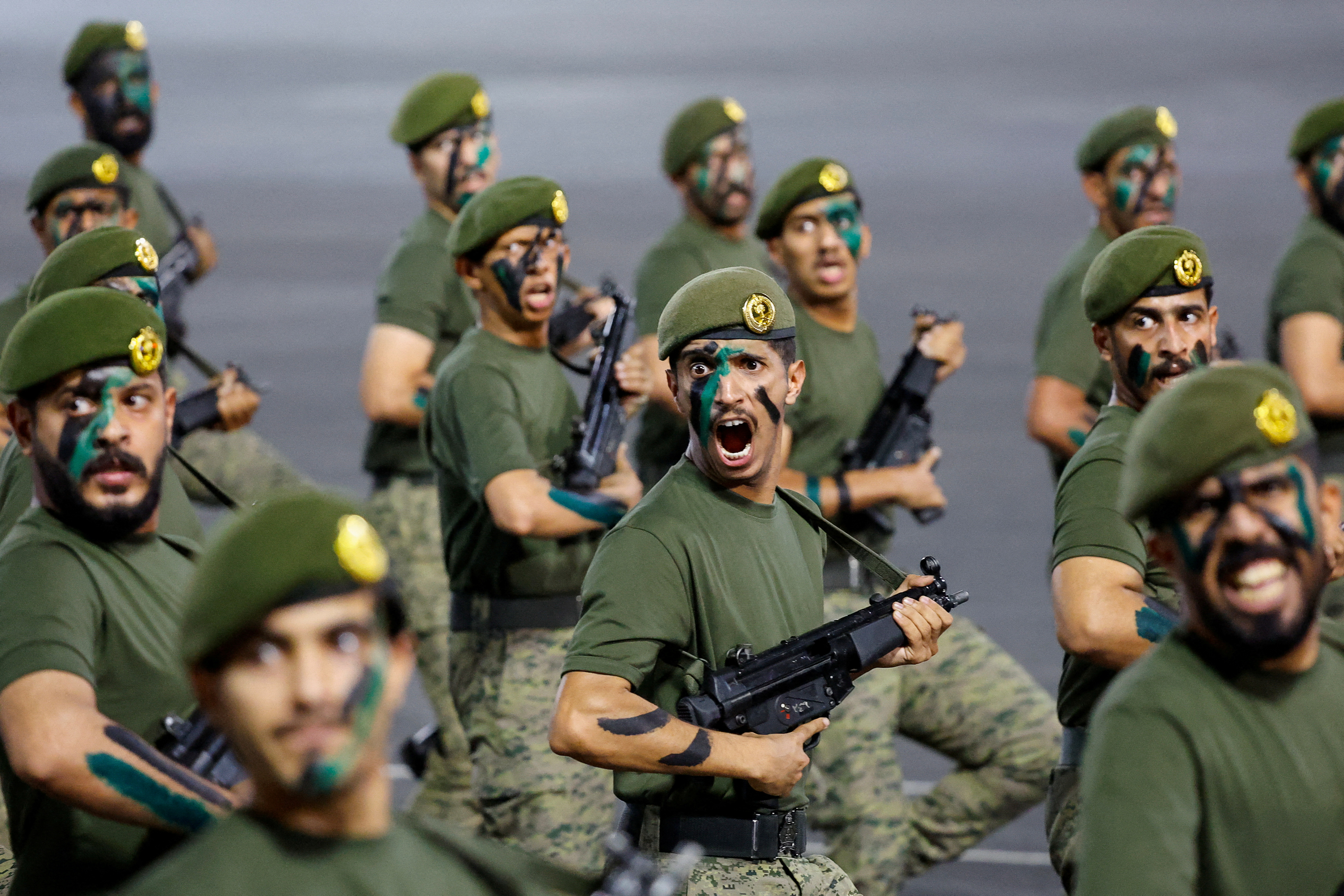Members of Saudi security forces participate in a parade, June 10, 2024. (Reuters)