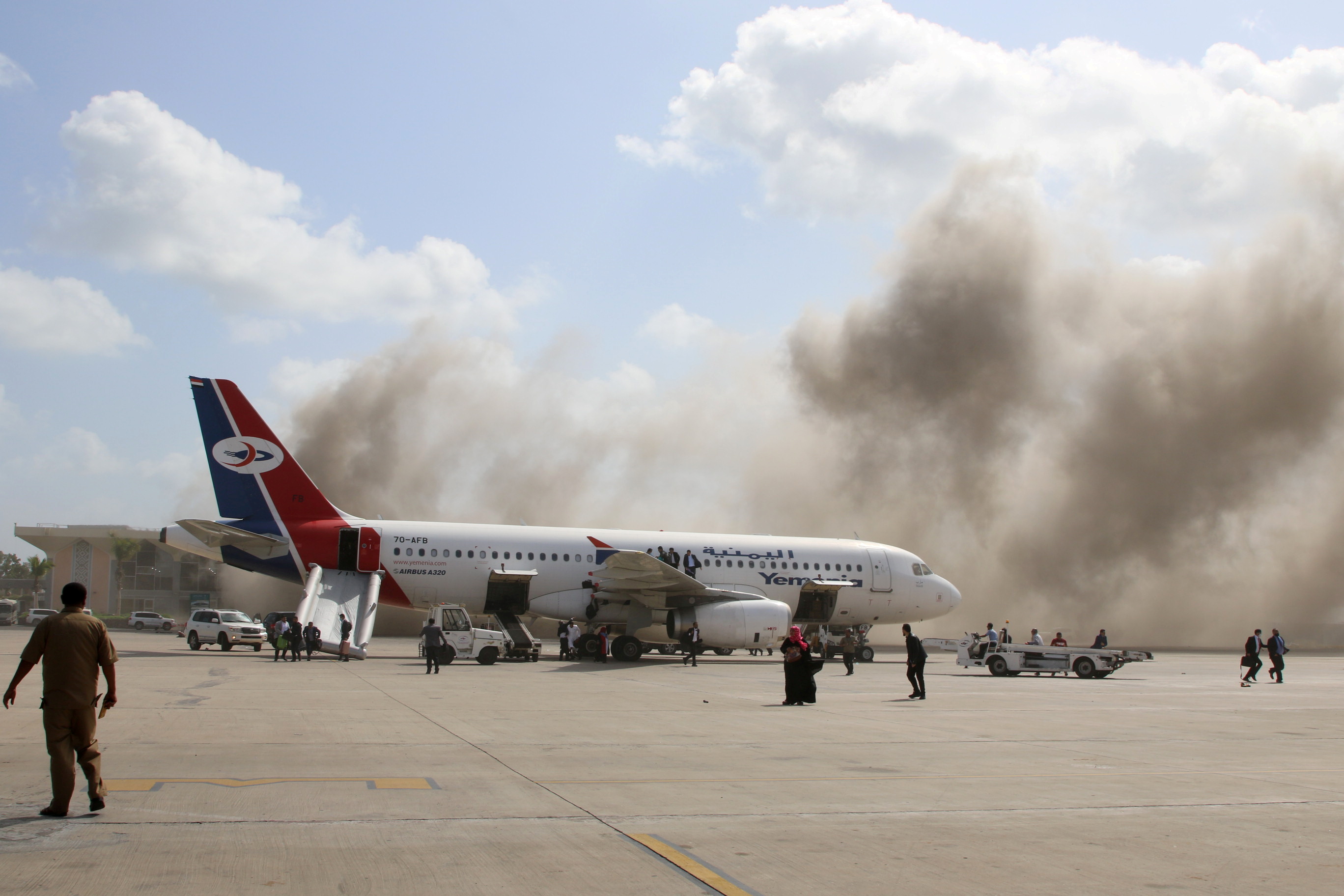 Smoke rises following a previous Houthi attack targeting Aden International Airport (Reuters)