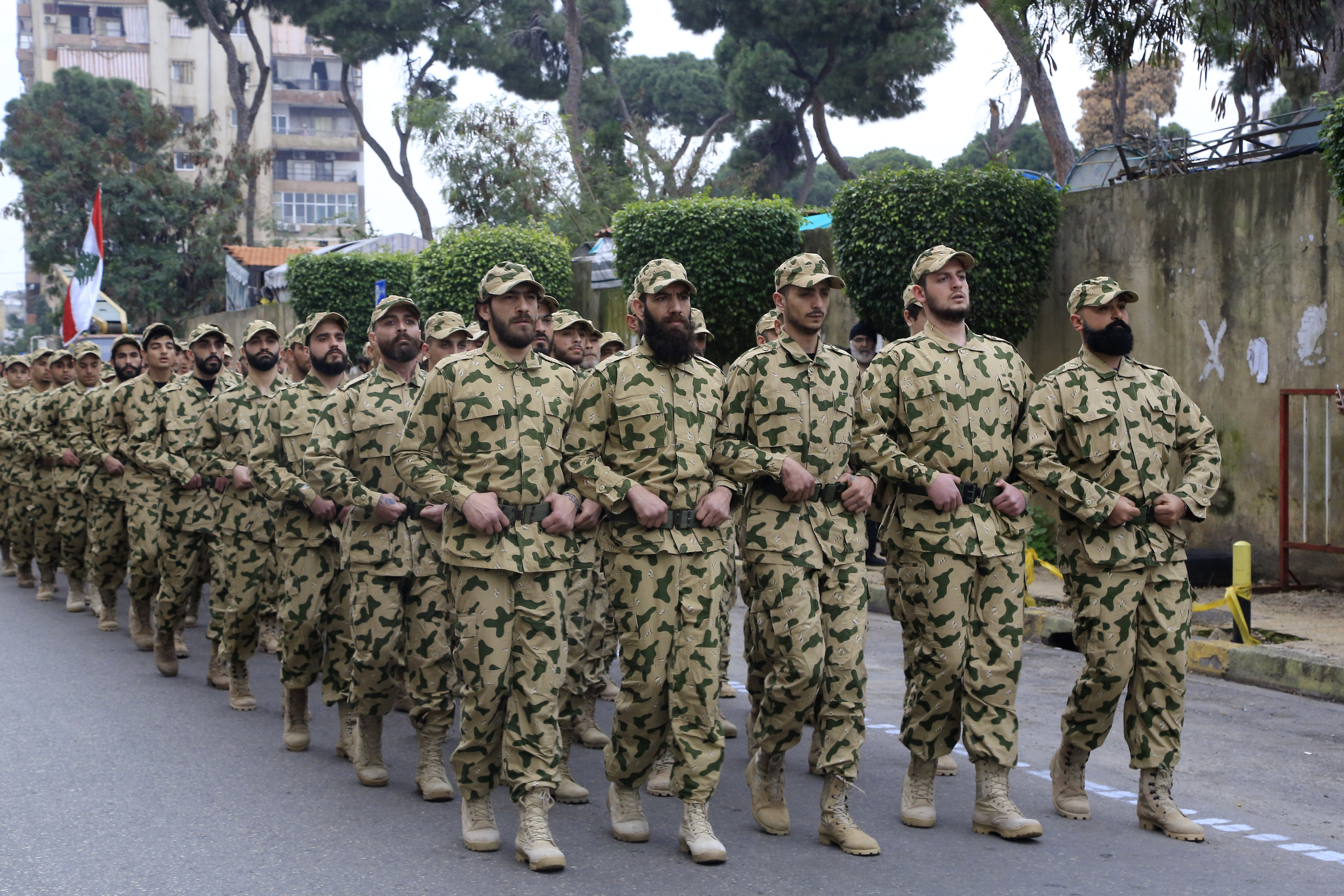 Fighters from the Lebanese Resistance Brigades, or Saraya al-Muqawama al-Lubnaniya. Members of the Hezbollah-affiliated group assaulted writer and activist Nabil Mamlouk at his father’s pharmacy. (AFP file)