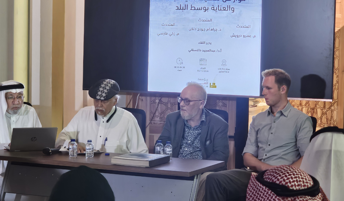 Graham and his son Joey during a forum held in Jeddah. (Supplied)