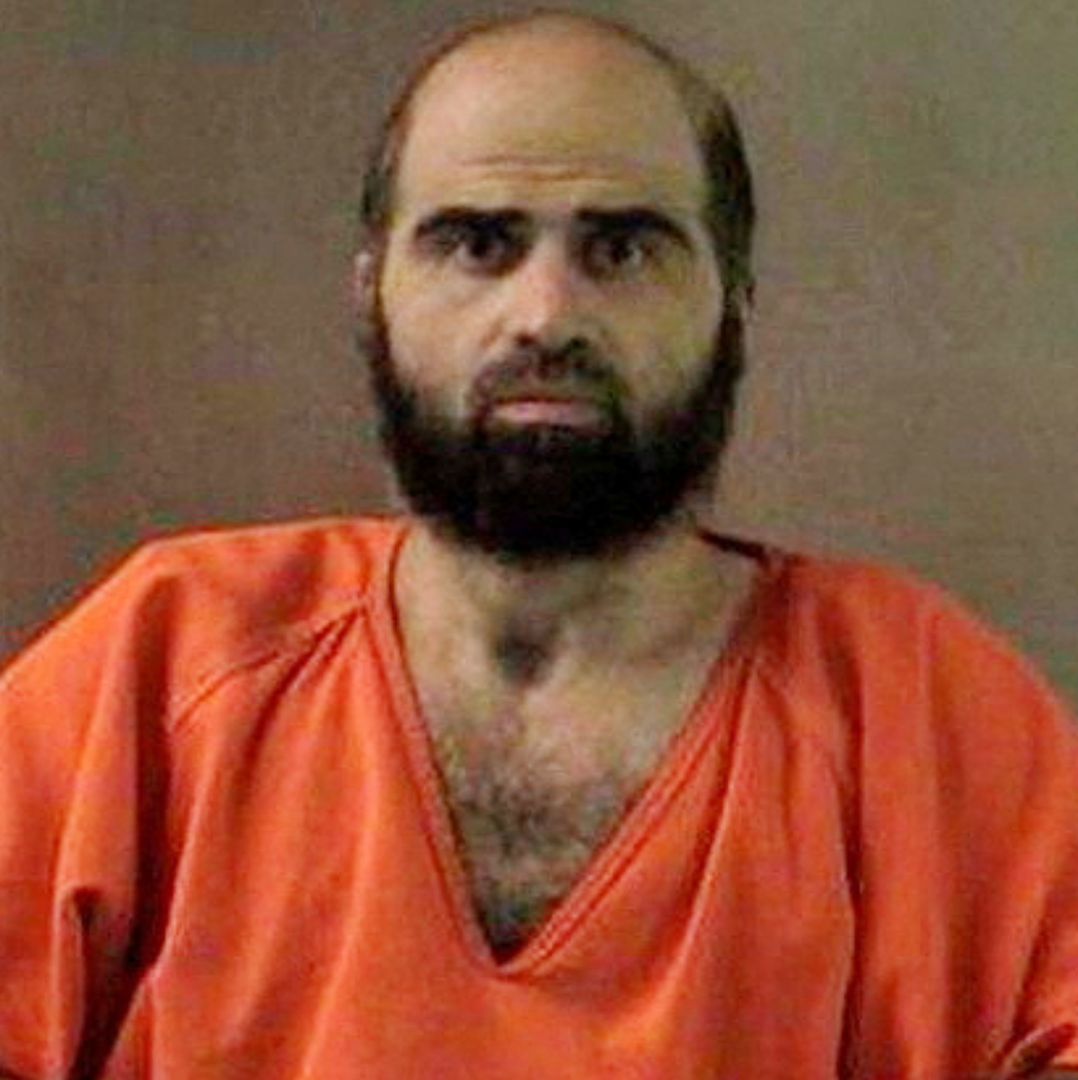 Nidal Hasan, charged with killing 13 people and wounding 31 in a November 2009 shooting spree at Fort Hood, is pictured in an undated handout photo obtained by Reuters on June 29, 2012. (REUTERS)