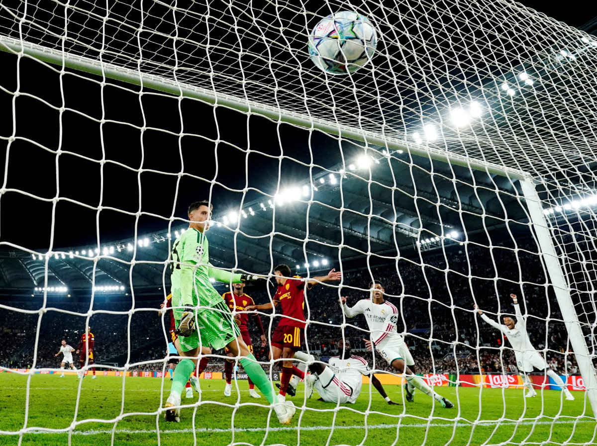 Real Madrid’s Antonio Rudiger scores his team’s fourth goal during the UEFA Champions League match against AS Roma at Stadio Olimpico in Rome, Italy, on October 14, 2026. (Reuters)