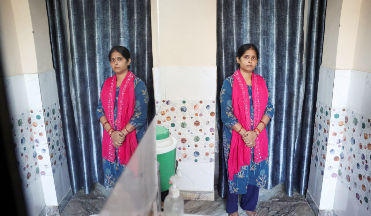 Mamta, a voter whose name was removed from the Special Intensive Revision (SIR) list published on August 1, 2026 and put under the Permanently Shifted category, poses for a photograph during a Reuters interview at her house in New Delhi, India, October 15, 2026. (REUTERS)