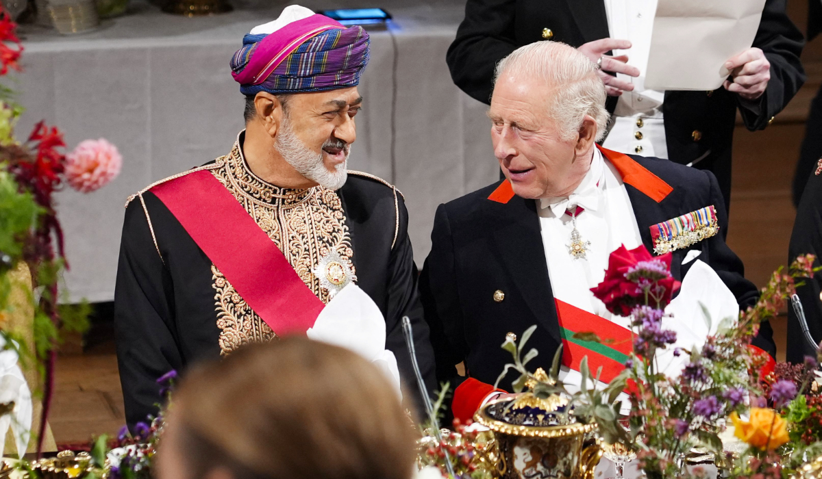 Oman's Sultan Haitham bin Tarik (L) shares a light moment with Britain's King Charles III during the State Banquet at Windsor Castle, Windsor, on October 20, 2026, the first day of a three-day State Visit to the United Kingdom by The Sultan of Oman. (AFP)