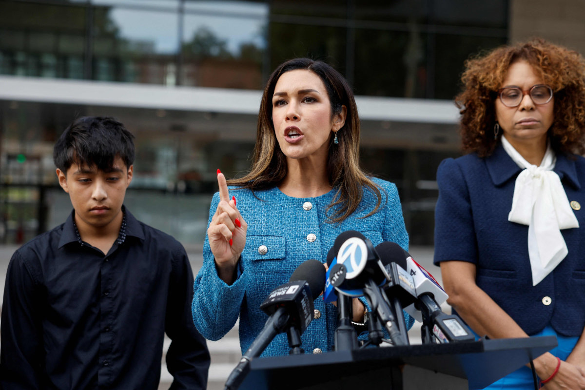 Civil rights attorney Denisse Gastelum speaks during a news conference in Los Angeles, California, on October 21, 2026, to mark the one-year anniversary of Carlitos Ricardo Parias’ shooting. Parias, known as “Richard LA,” remains in immigration detention with a gunshot injury that his attorneys say has not been adequately treated. (AFP)