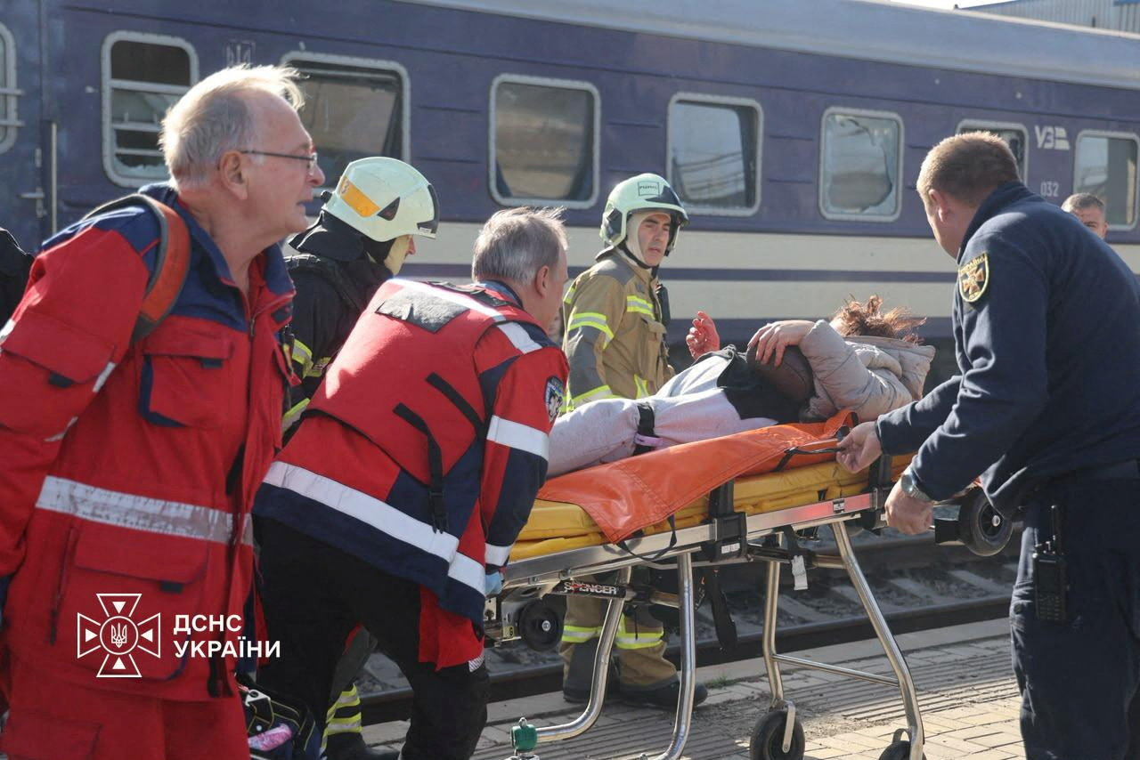 Emergency employees carry a person injured at a railway station during a Russian drone strike on Dnipro, Ukraine, October 29, 2026. (Ukraine government photo / via REUTERS)