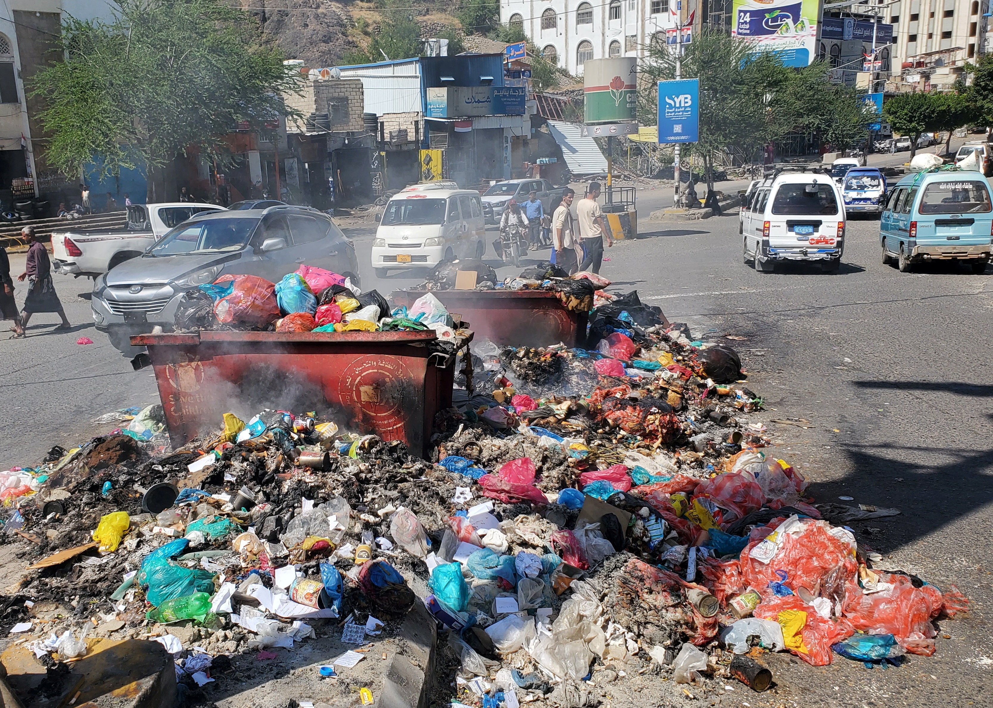 A pile of garbage on a street in Taiz. Although government-aligned forces control the city center, the Houthis have held surrounding positions, effectively restricting access in and out of the city. (Reuters/File)