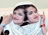 World Mourns Death of Twins