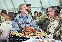 Bush Flies Into Baghdad in Thanksgiving Day Surprise