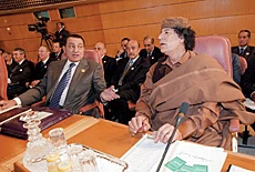 Qaddafi Walks Out