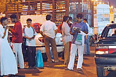 Hawkers Do Roaring Business in Counterfeit DVDs