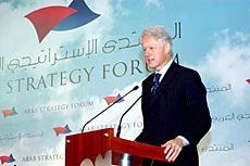 Clinton Calls for Concrete Strategy at Dubai Forum