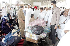 Pilgrims Persist in Lugging Luggage