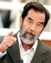 Defiant Saddam Pleads Not Guilty