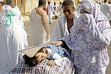 Officials Crack Down on Luggage-Laden Pilgrims