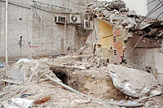 Engineers Look for Cause of Hotel Collapse