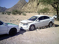 Youth Get Creative Using Rocks & Cars