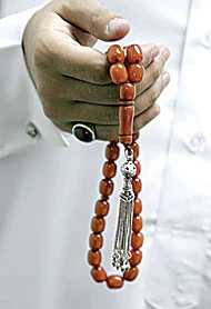The Handling of Prayer Beads