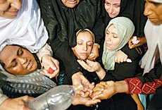 Israeli Attack Kills Woman, Unborn Baby