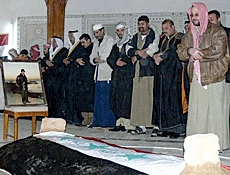 Jeers and Taunts for Saddam