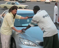 Washing the Cars Amid African Taunts and Saudi Admonition